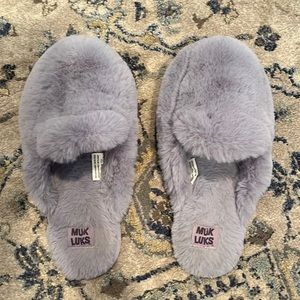 purple fluffy slippers